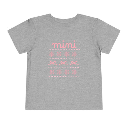 Mini Christmas Toddler Tee — Pink Bow & Snowflake Pattern Kids' Short Sleeve Shirt
