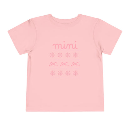 Mini Christmas Toddler Tee — Pink Bow & Snowflake Pattern Kids' Short Sleeve Shirt